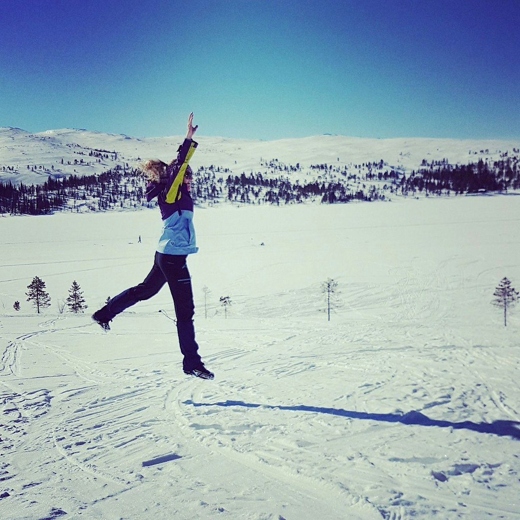 Hilde jumping in a snowy field